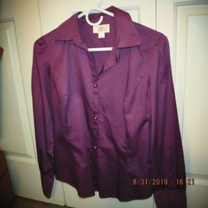 Long sleeved button-down dress shirt.